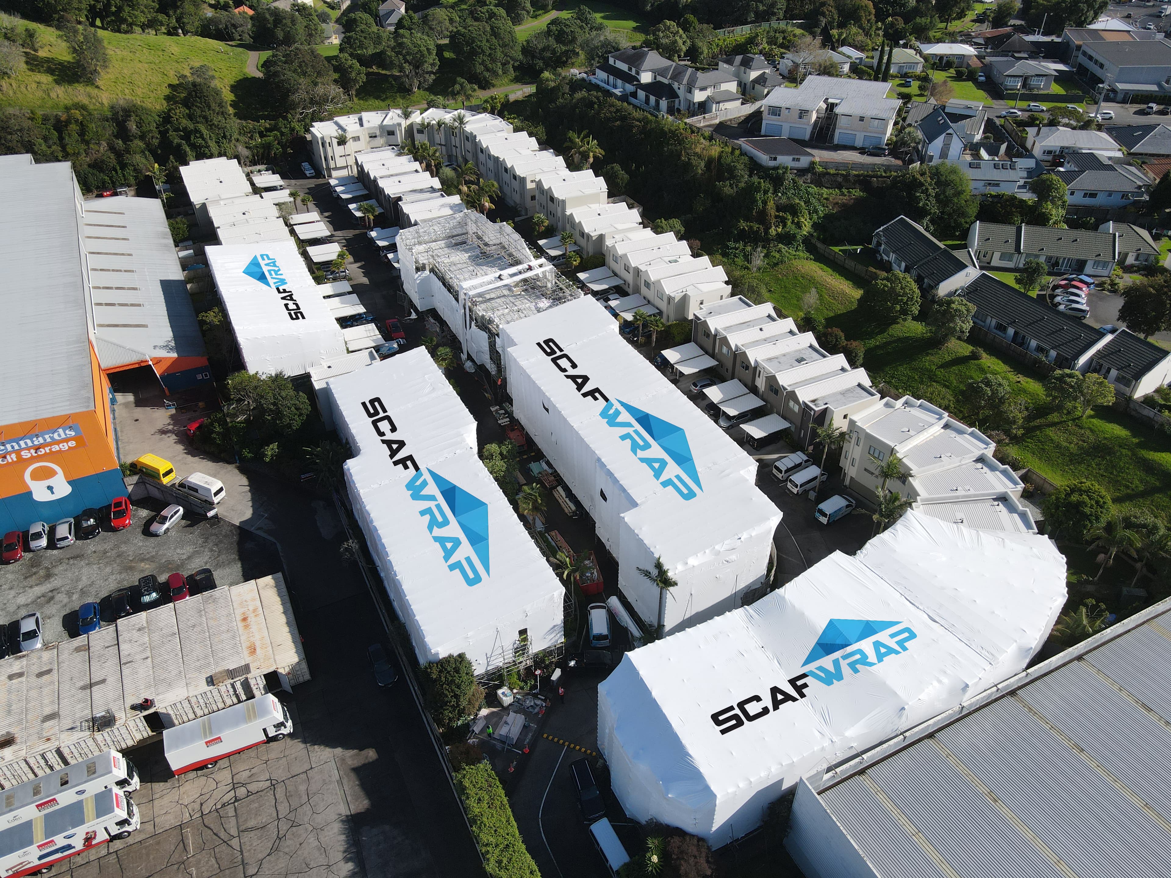 Shrink wrap weatherproofing on scaffolding at a construction site in Auckland, New Zealand