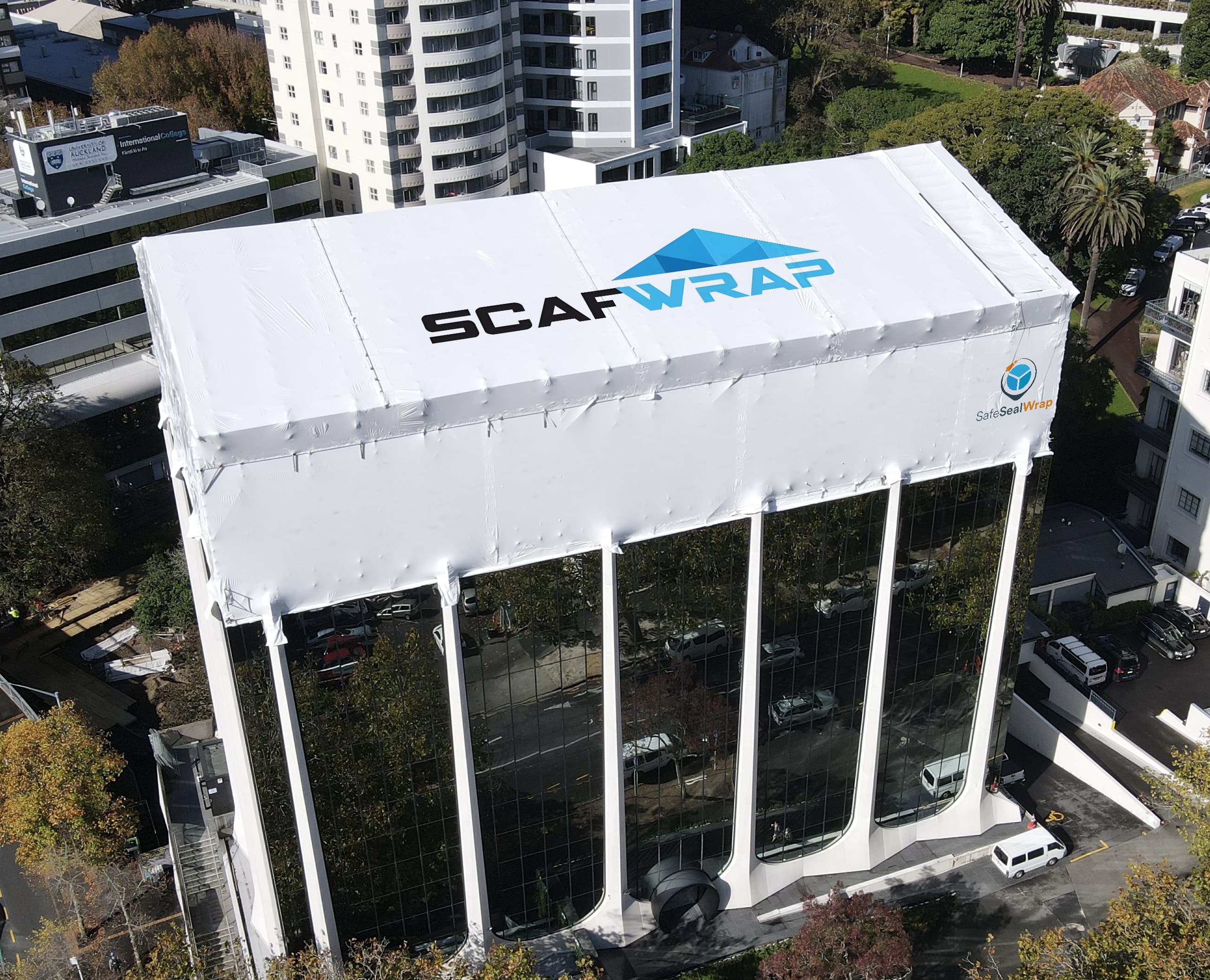 Residential building recladding project with weatherproof shrink wrap in Auckland